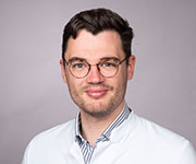 Dr. Dr. med. Lukas Müller, MBA